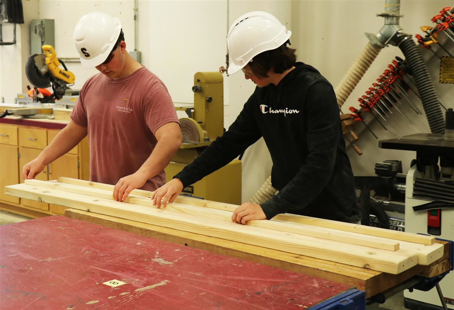 Two students work on the bunk bed project in Rockwood Summit's Geometry in Construction class